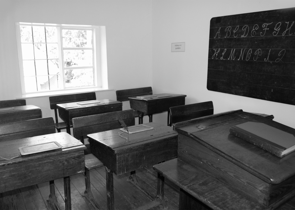 photograph of a victorian-era schoolroom.